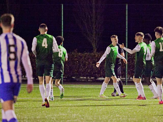 Josh McCulloch, centre, and Josh O'Connor (third right) celebrate as Hibs Under-18s see off Kilmarnock at HTC. Picture: Maurice Dougan