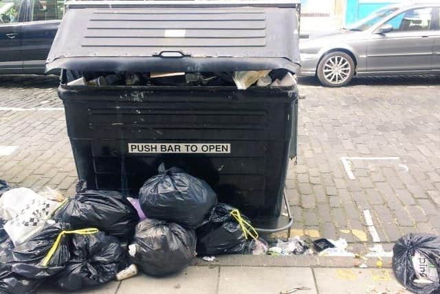 Overflowing bins and rubbish dumped alongside them are among the issues the council is being urged to address.