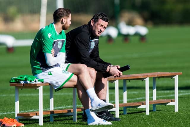 Jack Ross and Martin Boyle chat during training while the former was still manager of Hibs. Picture: SNS