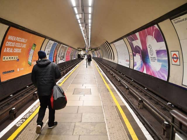 Few commuters wait on the platform during the rush hour at Clapham Common in London (Photo: JUSTIN TALLIS/AFP via Getty Images)