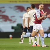 John McGinn of Aston Villa celebrates after scoring their side's first goal during the Premier League match between Aston Villa and Manchester City at Villa Park on April 21, 2021 (Photo by Carl Recine - Pool/Getty Images)