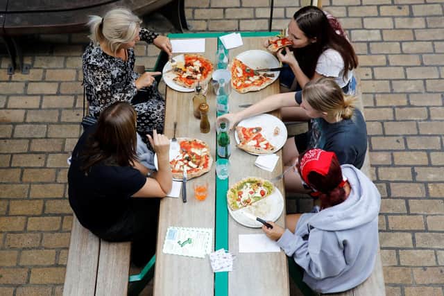 Doesn't everyone want to go out for a meal now that it's allowed, wonders Hayley Matthews (Picture: Tolga Akmen/AFP via Getty Images)