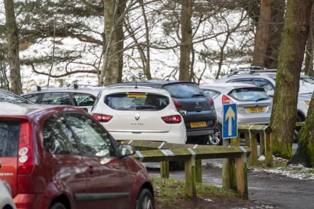 Car parks in the Pentlands have been popular in recent days as people venture out for exercise during the Christmas holidays while under level four restrictions. Pic: Andrew O'Brien