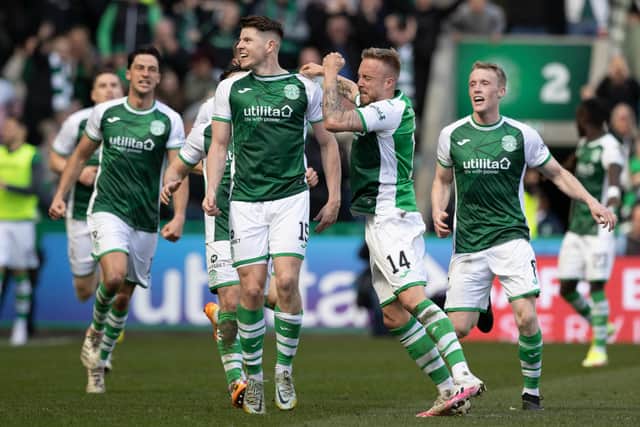 Doyle-Hayes and the Hibs players celebrate Kevin Nisbet's winner