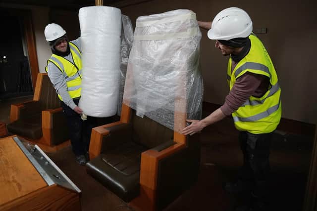 The Presiding Officer's chair is prepared for removal from the planend debating chamber in the former Royal High School on Calton Hill. Picture: Stewart Attwood