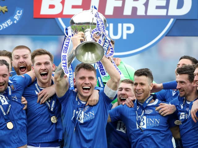 Jason Kerr of St Johnstone lifts the Betfred Cup after his side beat Livingston in the final at Hampden Park on Sunday (Photo by Ian MacNicol/Getty Images)