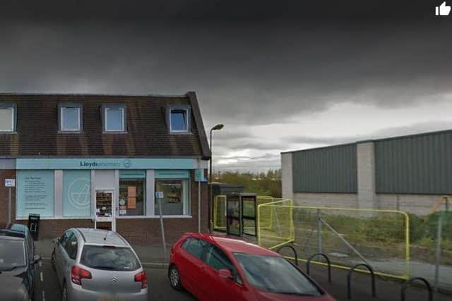 Staff at the pharmacy in King Street, Bathgate were threatened with a knife, police said.