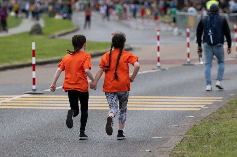 Two young friends take on the Edinburgh Marathon Festival challenge together.
