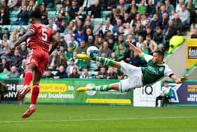 Mykola Kukharevych with an acrobatic effort on goal on his debut against Aberdeen at Easter Road. Picture: Paul Devlin / SNS