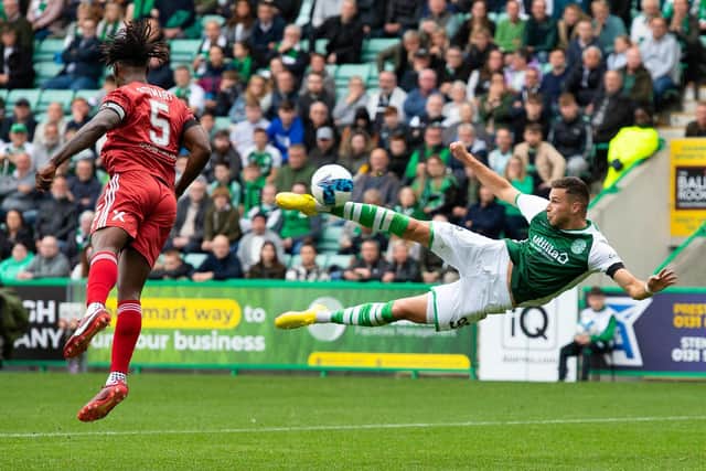 Mykola Kukharevych with an acrobatic effort on goal on his debut against Aberdeen at Easter Road. Picture: Paul Devlin / SNS