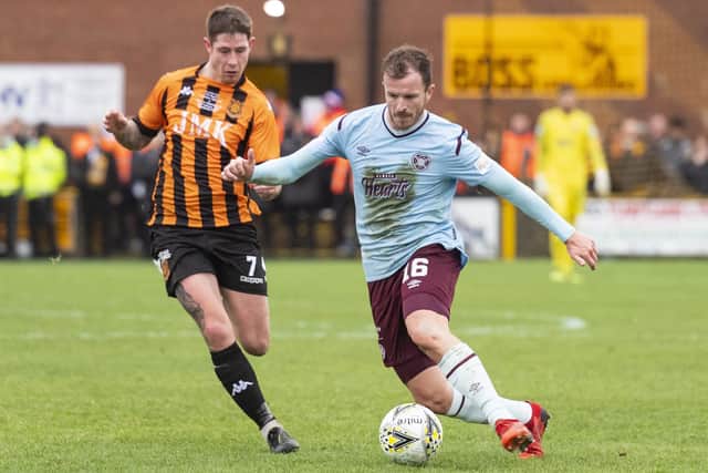 Andy Halliday takes on Auchinleck defender Gareth Armstrong during the Scottish Cup tie at Beechwood Park