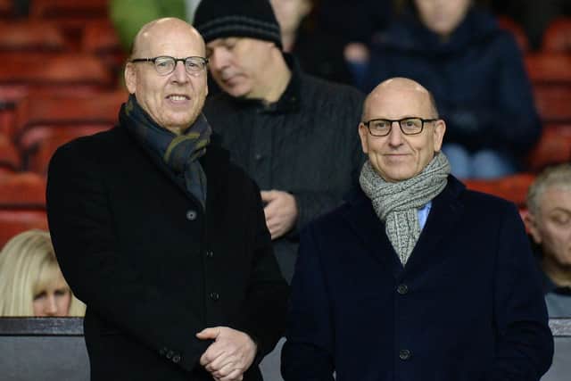 Manchester United's co-chairs Joel Glazer and Avram Glazer are ready to sell the club, potentially bringing down the curtain on an acrimonious 17 years under the family. Picture:   OLI SCARFF/AFP