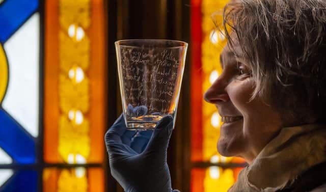 ‘Raising a glass to Robbie Burns’: Ahead of Burn Night on 25 January , Claudia Bolling  - House and Collections Officer at the Abbotsford Trust, holds - Robert Burns' glass tumbler, diamond-point engraved by the poet
