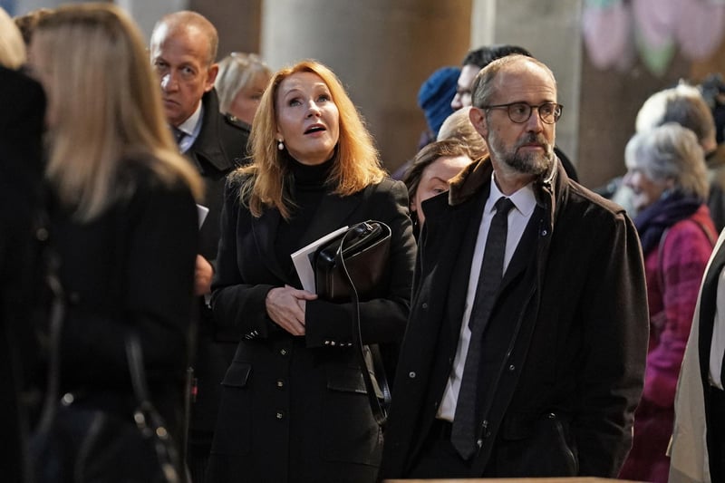JK Rowling and her husband Neil Murray arrive at the memorial service for Alistair Darling at Edinburgh's St Mary's Episcopal Cathedral.