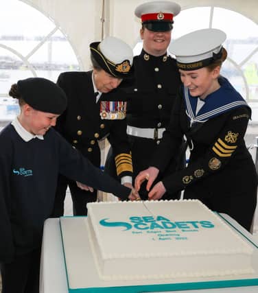 There's no official inauguration without a cake - and Princess Anne even helped slice it.
