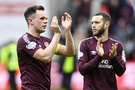 Hearts goalscorers Lawrence Shankland and Jorge Grant applaud the fans after beating Celtic.