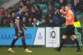 Kyle Vassell is shown a red card by referee John Beaton during Kilmarnock's 2-0 defeat at Easter Road. Picture: SNS