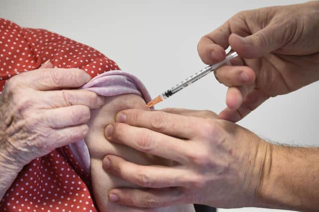 People are being vaccinated against the Covid-19 coronavirus but it will take time to build up herd immunity to the disease (Picture: Francois Lo Presti/AFP via Getty Images)