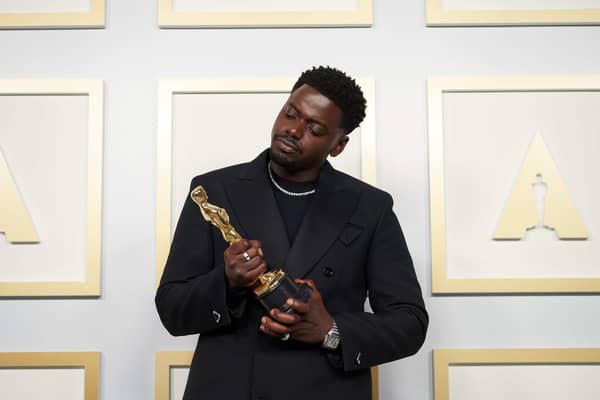 Daniel Kaluuya poses backstage with the Oscar for Best Actor in a Supporting Role, for Judas And The Black Messiah, at the 93rd Academy Awards ceremony.