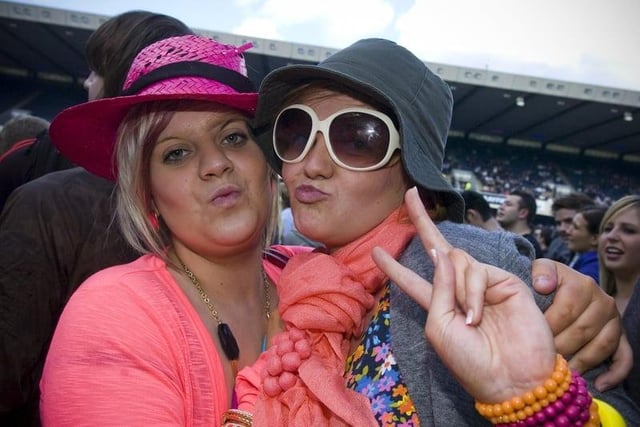 Two Oasis fans pictured at Murrayfield Stadium as the band played during the Dig Out Your Soul tour in 2009. Photo: Ian Georgeson