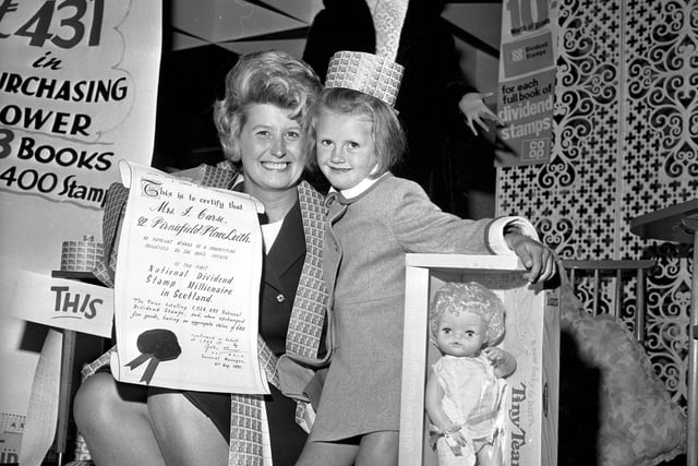 Mrs J Carse and daughter at Leith Provident, after Mrs Carse won 1 million Co-op dividend stamps (making her a 'stamp millionaire') in August 1970. Her daughter got a Tiny Tears doll.