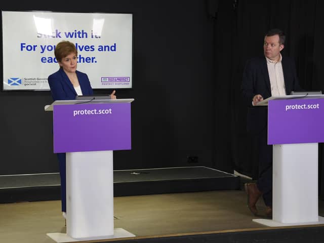The National Clinical Director Jason Leitch has been criticised for defending Nicola Sturgeon after she was pictured in a barber shop without a face mask.