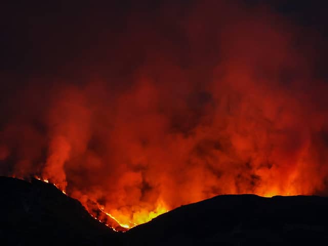 A wild fire burns on the Isle of Bute on April 10 in Colintraive on the Isle of Bute (Photo by Jeff J Mitchell/Getty Images)