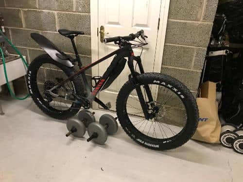 One of the bikes stolen from a garage at a property off  Craigielaw Park in Aberlady. A Canyon Fat Bike, black in colour with red text on the frame (Photo: Police Scotland).