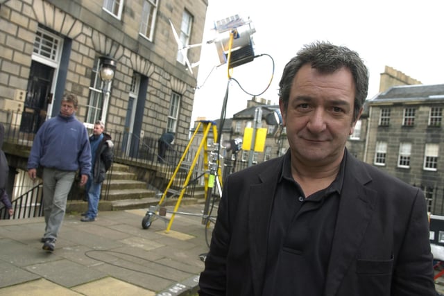 After Hannah quit the role of the Edinburgh copper, Capital actor Ken Stott took on the role appearing in three subsequent series, produced in-house by STV. Here he is pictured in June 2005 on location at Gloucester Place in Edinburgh for filming of the Fleshmarket Close episode.