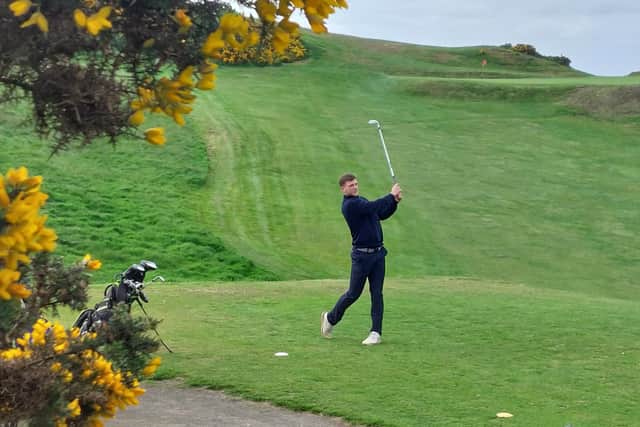 Former Hibs player Jamie Gullan, who is now at Raith Rovers, hits a tee shot at the second hole for Watsonians at the Braids. Picture: National World.