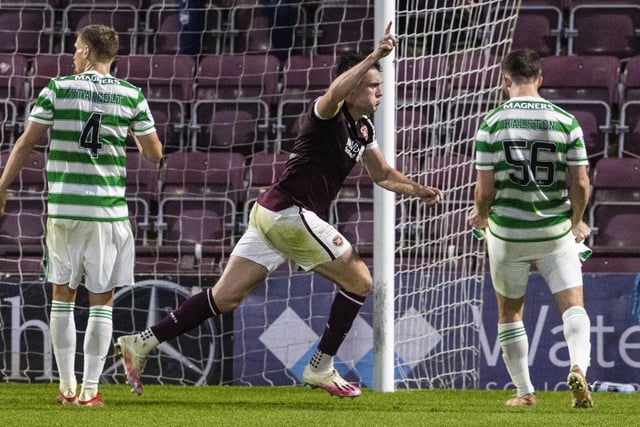 John Souttar celebrates after scoring the late winner against the eventual champions to get Robbie Neilson's side off to a flyer. Gary Mackay-Steven netted the opener before Anthony Ralston scored for Celtic.