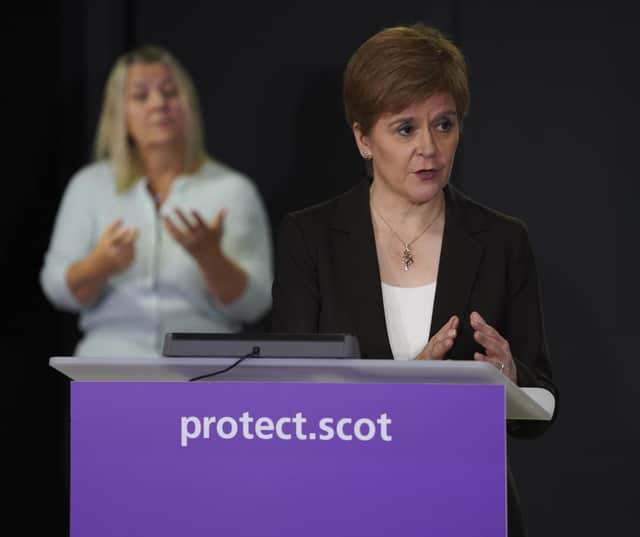 Decisions on areas moving through the tier system will be based on 'judgment' says Nicola Sturgeon