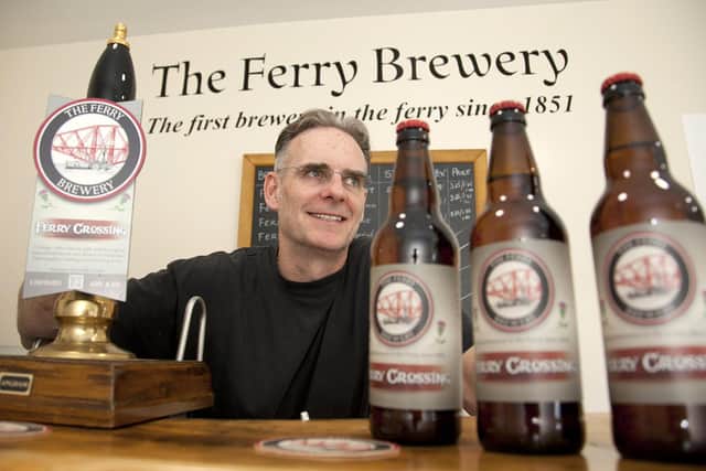 Stock photo taken in 2017 of Mike Moran of The Ferry Brewery with a ferry crossing beer. Photo by Alistair Linford.