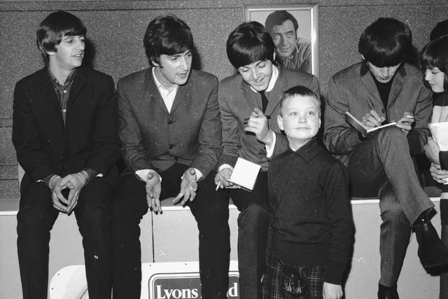 A fan in a kilt gets to meet the Beatles at the ABC cinema in Edinburgh in 1964.
