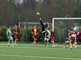 Motherwell goalkeeper Josh Bogan punches a corner clear during the 1-1 SPFL Reserve League draw with Hibs at HTC. Picture: Patrick McPartlin