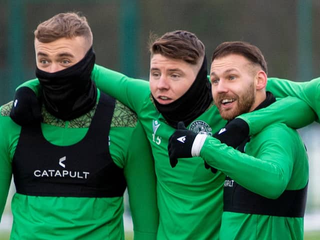 Hibs' Martin Boyle (R),  will be happy if the Easter Road club manage to keep hold of (L-R) Ryan Porteous and Kevin Nisbet. Photo by Ross MacDonald / SNS Group