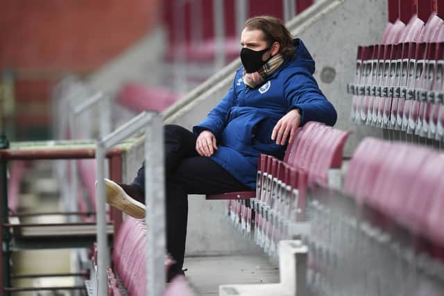 Robbie Neilson watches on from the Wheatfield Stand.