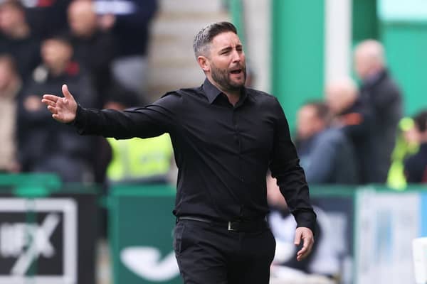 Lee Johnson gestures in the technical area during Hibs' 3-1 defeat by Rangers