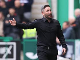 Lee Johnson gestures in the technical area during Hibs' 3-1 defeat by Rangers