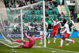 Hibs goalkeeper David Marshall is beaten by James Tavernier's free-kick as Rangers go 1-0 up at Easter Road. Picture: SNS