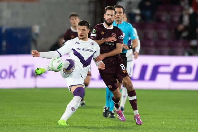 Hearts midfielder Orestis Kiomourtzoglou battles Luka Jovic during the Europa Conference League encounter against Fiorentina at Tynecastle. Picture: SNS