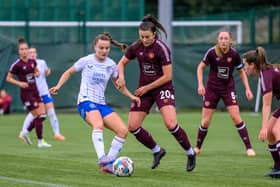 Carly Girasoli tackles Kirsty Howat. Credit: (© ScottishPower Women’s Premier League | Malcolm Mackenzie)