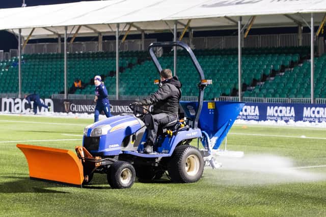 The pitch is treated ahead of kick off but it was to no avail as Glasgow Warriors v Edinburgh at Scotstoun was called off. Picture: Alan Harvey/SNS