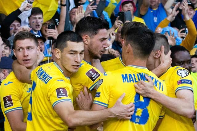 Ukraine players celebrate in front of their fans after Roman Yaremchuk made it 2-0 to the visitors at Hampden Park. Picture: SNS