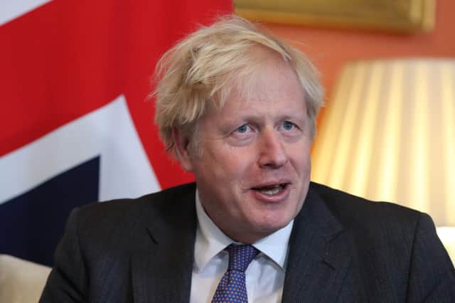 Britain's Prime Minister Boris Johnson inside 10 Downing Street on December 10