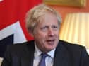 Britain's Prime Minister Boris Johnson inside 10 Downing Street on December 10