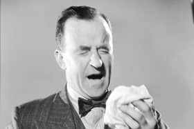 Remember, coughs and sneezes spread diseases, so please try to use a handkerchief (Picture: Fox Photos/Getty Images)