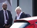 Former Prime Minister Boris Johnson arrives at Gatwick Airport in London, after travelling on a flight from the Caribbean, following the resignation of Liz Truss as Prime Minister. Picture date: Saturday October 22, 2022.