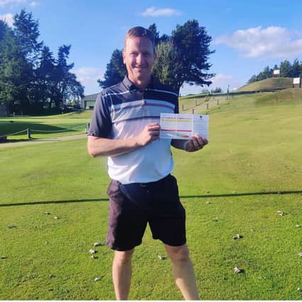 Steven Armstrong shows off his card after posting a 59 in Saturday's Mixed Medal Stableford at Turnhouse.