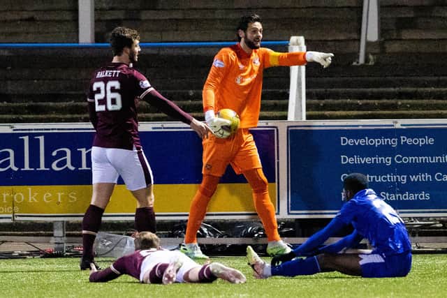 Craig Gordon was unhappy with the award of a penalty. Picture: SNS